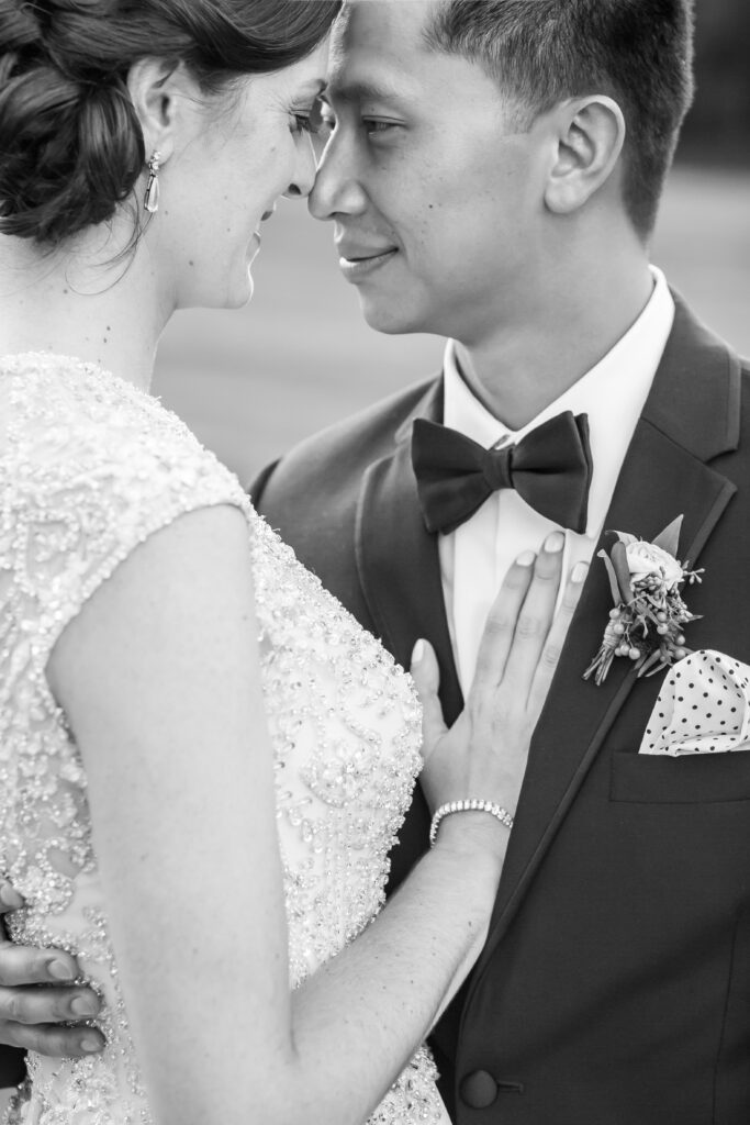b&w close portrait up of bride and groom 